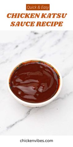 a white bowl filled with sauce sitting on top of a marble counter next to the words quick and easy chicken katsu sauce recipe