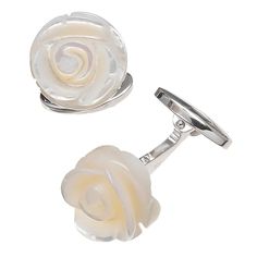 When you're looking to up the romance, these bestselling delicate floral cufflinks are ideal. Mother of Pearl gemstones are hand carved into naturalistic roses, set by hand on 925 sterling silver. These fan-favorite cufflinks are ideal for weddings or simply for the man who likes the sweeping idea of precision romance. Mother Of Pearl Rose, Tuxedo Studs, Designer Cufflinks, Pearl Cufflinks, Floral Cuff, Coming Up Roses, Silver Cufflinks, Cufflinks Men, Pearl Gemstone