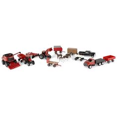 a group of toy trucks and farm equipment