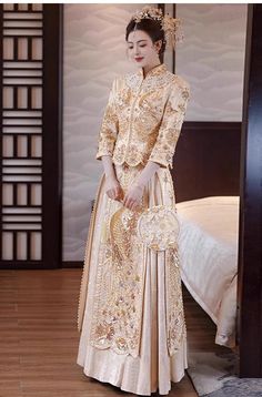 Looking a traditional Chinese bridal gown. This beautiful 2-piece qun kwa set is embroidered with gold, silver threads, decorated with the intricate faux pearls , sequins and beads through the jacket and skirt. It's a perfect option for your traditional Chinese wedding, tea ceremony Matching Tang wedding suit for Groom. Size Guide: Please leave your Height, Weight and Bust measurements in the Personalisation box so we could double check the size for you Japanese Wedding Dress, Traditional Chinese Wedding, Qipao Cheongsam, Japanese Wedding, Wedding Suits Groom, Chinese Wedding, Wedding Essentials, Chinese Dress, Indian Wedding Dress