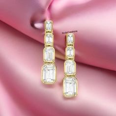 18.5 TCW Emerald Cut Liner Drop Wedding Earrings, 4 Diamond Bezel Set Screw Back Earrings, 14k Yellow Gold Engagement Earrings, Gift For Her Detail about stones Moissanite & Simulated Stone: ----------------------------- Stone Shape : Emerald Cut Stone Size : 10X8 mm, 9X6 mm, 8X6 mm, 7X5 mm Weight: 18.50 TCW Color: Colorless Cut: Excellent Clarity: VVS ✎ This is all our photography. This listing's image is only reference image. If you give me order then I will make this jewelry looks like listing's image ✿ Place your custom order here ☛ handmade moissanite made with festinating and brilliance. Stone is produced with excellent cuts, grades and superior quality. ☛ Metal Option: Silver/10KT/14KT/18KT ☛ Metal Tones: Yellow Gold, White Gold, Rose Gold   ✿ Stone type options: ☛ Natural Diamond, Gold Linear Earrings With Prong Setting For Wedding, Formal Gold Bezel Set Earrings, Yellow Gold Diamond Linear Earrings For Wedding, Luxury Gold Linear Earrings For Wedding, Gold Linear Anniversary Earrings With Prong Setting, Yellow Gold Earrings With Bezel Setting For Wedding, Gold Diamond Earrings With Bezel Setting For Anniversary, Gold Diamond Earrings With Bezel Setting For Wedding, Gold Linear Earrings With Prong Setting For Anniversary