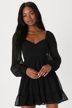 You're certain to fall for the Lulus Longing And Love Black Swiss Dot Puff Long Sleeve Mini Dressâ€”and once you've got it, everyone else will be falling for you! Lightweight woven fabric, embellished with Swiss dots, forms a bustier-inspired bodice with a sweetheart neckline and sheer balloon sleeves with elastic at the shoulders and cuffs. A high set-in waist tops the two-tiered mini skirt, falling to a ruffled hem. Double ties across the open back give this dress a flirty and fun finish. Hidd Wrap Sweater Dress, Casual Formal Dresses, Dress Tiered, Long Sleeve Cocktail Dress, Tiered Mini Dress, Black Dress With Sleeves, Long Sleeve Dress Formal, Lulus Dresses, Puff Long Sleeves