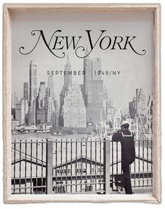 a man standing next to a fence in front of a cityscape with the words new york on it