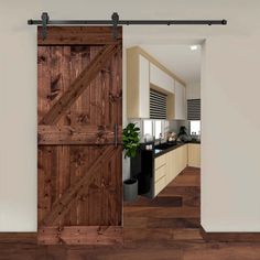 an open sliding barn door in a kitchen