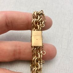 "Quantity: 1 Unit Dimensions: Length - 7\" (0.2m) Width - 0.3\" (9mm) Marked \"12KT GF\" Includes safety chain & split rings to add charms to." 1950s Bracelet, Blue Chandelier, Soldered Pendants, Copper Patina, Split Rings, Vintage Texture, Safety Chain, Tucson Az, Pearl Grey