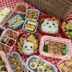 a table topped with lots of food and containers filled with different types of foods on top of it