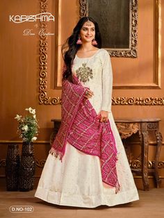 Bollywood style designer silk anarkali top with zari bhuttis and bandhni dupatta. Anarkali is made of tapeta silk fabric and comes with a lining.  Size: XL Bust Size: 40 - 41 inches, Waist: 38 inches, length: 56 inches Bandhani Print Dupatta For Diwali, Churidar With Bandhani Print For Wedding And Eid, Wedding Churidar With Bandhani Print For Eid, Anarkali White Kurta With Bandhani Print, Bandhani Print Anarkali Sharara For Eid, White Anarkali Kurta With Bandhani Print, Diwali Bandhani Print Semi-stitched Anarkali Set, Diwali Bandhani Semi-stitched Anarkali Set, Festive Bollywood Anarkali Set With Bandhani Print