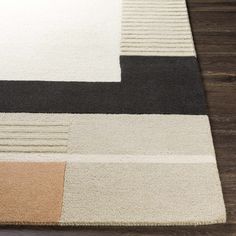 an area rug with different colored squares on it