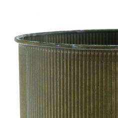 a close up of a metal container on a white background with no people around it