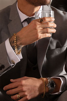 Suited and booted, ready for the weekend 🥃⁠ Popular Bracelets, Popular Necklaces, Blazer Outfits Men, Popular Rings, Heavy Chain, Claddagh Rings, Hand Watch, Perfect Gift For Him