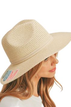 This Straw Beach Bum Panama Hat is crafted from straw, with an internal drawstring and 3'' brim for a custom fit. Featuring bright pastel colored sequin lettering and a faux leather tailored hat band, the Straw Beach Bum Panama Hat provides an eye-catching look while offering reliable sun protection. Beige Brimmed Panama Hat For Vacation, Trendy Beige Sun Hat For Travel, Adjustable Cream Straw Hat For Vacation, Cream Short Brim Panama Hat For Beach Season, Cream Panama Hat With Short Brim For Beach Season, Trendy Cream Straw Hat For Beach, Cream Brimmed Panama Hat For Beach Season, Trendy Cream Straw Hat For The Beach, Cream Straw Hat With Curved Brim For Vacation