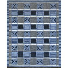 a blue and gray rug with squares on it