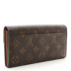 This is an authentic LOUIS VUITTON Monogram Sarah Wallet NM. This wallet is crafted of traditional Louis Vuitton monogram toile canvas. The envelope-style crossover flap opens with a polished brass snap to a partitioned terra cotta cross-grain leather interior with card slots, patch pockets, a central zippered compartment. Louis Vuitton Wallet, Terra Cotta, Leather Interior, Polished Brass, Authentic Louis Vuitton, Crossover, Louis Vuitton Monogram, Patch Pocket, Card Slots