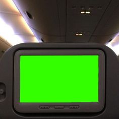 a green screen on the back of an airplane