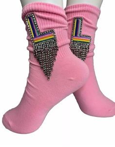 Women's Rainbow L Initial Rhinestone Fringe Black Socks. Get ready to add a pop of color to your outfit with these Women's Rainbow N Initial Fringe Rhinestone Black Socks. These socks are specially designed for those who wear sizes 6-10 and feature a stylish black base with colorful rainbow fringe and rhinestones that spell out the letter 'N'. These socks are not only visually appealing but also incredibly comfortable, making them perfect for all-day wear. The fringe adds a playful touch that will make your outfit stand out from the crowd, while the rhinestones provide just the right amount of sparkle. Please note that these socks aren't suitable for wide feet. The design might look simple at first glance, but it's filled with details that will surely catch everyone's attention. In summary Rainbow Fringe, N Initial, L Initial, M Initial, Slouch Socks, Rhinestone Fringe, Comfortable Socks, Girly Accessories, Black Socks