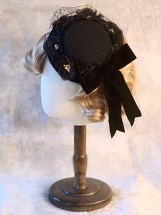 Handmade Black Bowknot Floral Design Veil Mini Hat Vintage Black Handmade Top Hat, Black Hats With Round Crown, One Size Fits Most, Victorian Black Adjustable Top Hat, Victorian Adjustable Black Top Hat, Adjustable Bow Hat For Kentucky Derby, Black Adjustable Victorian Top Hat, Adjustable Hats With Bow For Kentucky Derby, Adjustable Kentucky Derby Hat With Bow, Adjustable Mini Hats With Bow For Kentucky Derby