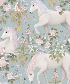 an image of two unicorns and flowers on a blue background