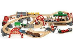 a toy train set with cars, trucks and tracks is shown on a white background