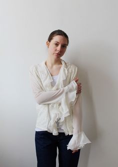 Such a dreamy filmy white ruffled blouse, with lace panels and gorgeous bell ruffle sleeves. Slightly sheer.  Tags have been removed. Gauzy and slinky poly or acetate.  Measures:  Bust: up to 42" Waist: up to 40" Condition: excellent.  FOLLOW US ON INSTAGRAM FOR DEALS AND SNEAK PEEKS! @Wildthingvintage instagram.com/wildthingvintage Twitter: @Wildthingpeck Message me any time for further details or questions. Please note there is a 10% restocking fee on orders cancelled prior to shipment. Return Ethereal Romantic, Pixie Outfit, White Sheer Top, Ruffled Blouse, Leopard Print Blouse, Ruffle Sleeves, Lace Panelled, Sheer Top, Flared Sleeves