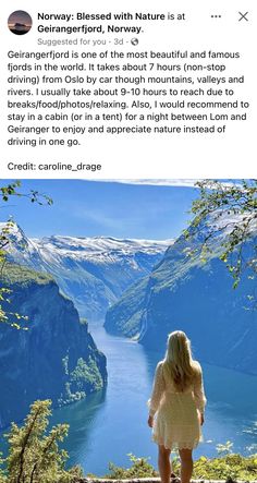 a woman standing on top of a cliff looking at the water and mountains in norway