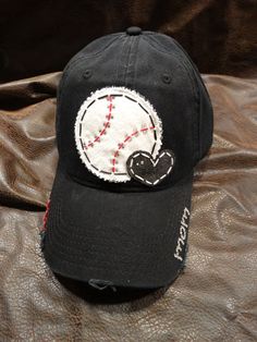 PLEASE READ MY SHIPPING DETAILS & ORDER POLICIES BEFORE YOU ORDER  This super cute Baseball LOVE Mom Bling Ball Cap includes: **Black distressed ball cap **Stitched, applique baseball with rhinestone embellishing **Fabric appliqued heart **mom on bill. If you want something else, Cute Personalized Baseball Cap With Curved Brim, Personalized Cute Baseball Cap With Curved Brim, Customizable Black Hats For Baseball Season, Fun Personalized Adjustable Baseball Cap, Personalized Adjustable Fun Baseball Cap, Customizable Custom Baseball Cap With Curved Bill, Fun Personalized Baseball Cap, Personalized Trucker Hat With Curved Brim As Gift, Customizable Black Adjustable Baseball Cap