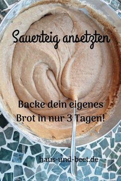 there is a cake in the bowl with a spoon next to it that says sauterig anstettenn backe dem eigens brot im nur 3 tagen