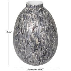 the size of a vase is shown with measurements