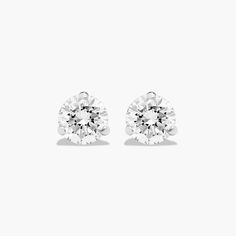 14K White Gold Three Prong Martini Round Lab-Grown Diamond Stud Earrings (0.50 CTW - F-G / VS2-SI1). These three-prong martini settings have five pieces of metal; three prongs, under bezel and post that are all constructed to the exact size of the lab created diamonds being used to ensure they sit perfectly flush into the setting. The lab created diamond is set exactly as the Martini design was intended - as an earring that floats on the ear - perfectly. Screw backs are available for an addition Gia Certified Round Cut White Gold Diamond Earrings, Gia Certified 14k White Gold Round Cut Diamond Earrings, Gia Certified White Gold Round Cut Diamond Earrings, Diamond White Prong Set Lab Grown Diamond Earrings, Macy's Brilliant Cut Diamond White Earrings, Diamond Earrings Studs Round, Lab Created Diamonds, Fine Jewellery Earrings, Round Brilliant