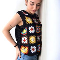 Crochet Knit Sleeveless Vest, Sleeveless Crochet Knit Vest, Casual Crochet Sleeveless Vest, Casual Sleeveless Crochet Vest, Casual Crochet Cotton Vest, Casual Cotton Crochet Vest, Casual Sleeveless Granny Square Top, Multicolor Sleeveless Crochet Top With Granny Square, Multicolor Sleeveless Granny Square Top