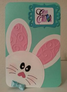 a close up of an easter card with a bunny face and bow tie on it