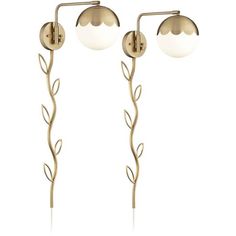 two lights that are next to each other on a white background, one is gold and the other is silver