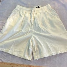 Nwt Great White Shorts, One And Three-Quarter Inch Waistband With Elastic And Workable Drawstring. Front Pockets. Never Been Worn. Size Large. Waist 16 Inches. Inseam 7 Inches. Rise 15 Inches. And The Length From Waist To Hem 20 Inches. The Unique Nature Of This Clothing Is That It Has Been Garment Died. The Soft Well Worn Look Has Slight Color Shadings As Part Of Its Characteristics. Leisure Short Summer Pants, Bermuda Bottoms For Spring Leisure, Leisure Bermuda Bottoms For Spring, Spring Bermuda Leisure Bottoms, Cream Summer Bottoms With Relaxed Fit, Cream Shorts With Elastic Waistband And Relaxed Fit, Cream Relaxed Fit Shorts With Elastic Waistband, Cream Relaxed Fit Summer Bottoms, White Leisure Bottoms For Summer