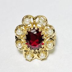 Vintage 14K Yellow Gold Oval Ruby Seed Pearl Cluster Ring Size 6.5 Top measures approx. 18.4 x 21.4 x 10.4 mm Shank width approx. 1.6 mm Stamped 14K Total weight approx. 7.27 g Condition preowned, please see photos for detail Pearl Cluster Ring, Antique Jewelry Rings, Pearl Cluster, Seed Pearl, Pearl Size, Cluster Ring, Vintage Watches, Antique Jewelry, Ruby