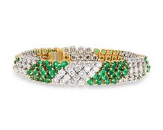 Dramatic emeralds are complemented by brilliant white diamonds in this glamorous design by the renowned Hammerman Brothers. The platinum and 18K yellow gold bracelet features diamonds totaling approximately 11.60 carats set beside an array of verdant emeralds. Creatively conceived and expertly crafted, this bracelet is exemplary of Hammerman Brothers ornate, high-quality output. 7 1/4" length Gala Jewelry, Bracelets For Sale, Designer Bracelets, Emerald Bracelet, Jewelry For Sale, Expensive Jewelry, Yellow Gold Bracelet, Van Cleef, Blue Diamond