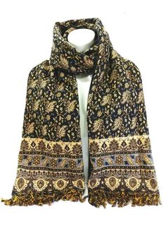 This Paisley Woolen Shawl is made-up of 50% Himalayan Wool and 50% Organic Cotton. It is very soft and warm. You can take this shawl wherever you like because it’s lightweight (400 gm). You can use this as a head wrapper, neck scarf, or simply cover around the body. To wash these beautiful scarves or shawls, you can put them in a washing machine on delicate or hand wash in cold water. It dries up really quickly. This shawl is handmade in Nepal by local women. MOQ: 30 pcs (Available in the same c Winter Pashmina Shawl With Paisley Print, Winter Paisley Print Pashmina Shawl, Winter Pashmina Scarf With Paisley Print, Fall Pashmina Scarf With Paisley Print, Winter Paisley Print Pashmina Scarves, Winter Paisley Print Pashmina Scarf, Black Bohemian Pashmina Shawl For Winter, Bohemian Patterned Scarves For Fall, Bohemian Paisley Print Scarves For Fall