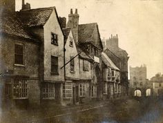 an old black and white photo of some buildings