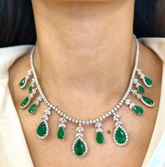 Check out this stunning pear shape necklace! This necklace features 13 natural pear shape emeralds weighing 19.38 ct and diamonds weighing 17.21 ct set in 18k white gold. The diamonds boast F/G in color, and VS1/VS2 in clarity. Such an amazing piece to add to any jeweler's collection! Emerald Diamond Necklace, Sapphire Diamond Necklace, Emerald Diamond Ring, Emerald Necklace, White Gold Necklaces, Modern Necklaces, Wedding Jewellery Necklace, Emerald Stone, Emerald Jewelry