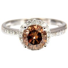 1.78 Carat Natural Fancy Vivid Orange Brown Diamond Ring 18 Karat | From a unique collection of vintage Solitaire Rings at https://www.1stdibs.com/jewelry/rings/solitaire-rings/. Orange Diamond Ring With Prong Setting, Brown Diamond Ring Fine Jewelry, Classic Brown Diamond Jewelry, Luxury Brown Jewelry With Brilliant Cut, Brown Diamond Ring With Diamond Accents For Anniversary, Brown Diamond Ring With Accents For Anniversary, Anniversary Brown Diamond Ring With Accents, Elegant Brown Diamond Ring, Brown Round Diamond Ring In Fine Jewelry Style