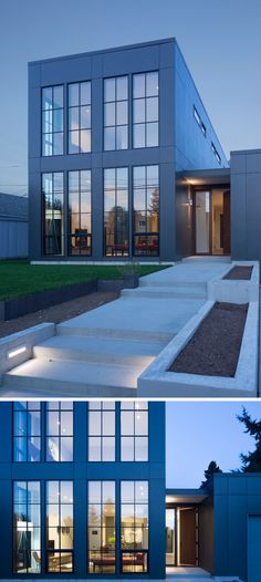 this modern house has large windows and steps leading up to the front door, which are lit up at night