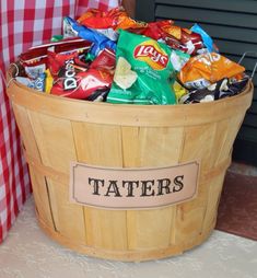 a wooden basket filled with lots of chips