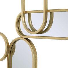 A striking labyrinth of mirror and gold leaf ellipses, the On Track wall mirrored panel adds modern flair to any wall design. May be hung horizontal or vertical. Uttermost Wall Art, Uttermost Furniture, Uttermost Mirrors, Mirror Panel, Picture Frame Shelves, Mirrored Wall, Richmond Interiors, Lighting Accessories, Luxury Aesthetic