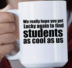 a person holding a coffee mug with the words students as cool as us