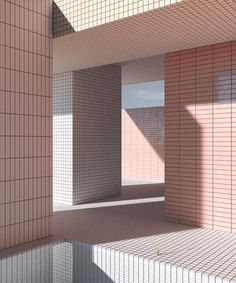 an empty room with pink and white tiles on the walls is shown in this image