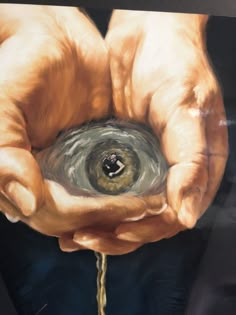 a painting of two hands holding an object in the palm of their hand, with water coming out of it