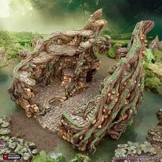 a model of a tree house made out of rocks