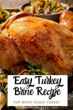 a roasted turkey on a platter with potatoes and carrots next to the words easy turkey brine recipe for moist roast turkey