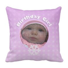 a pink pillow with a snowflake photo on it