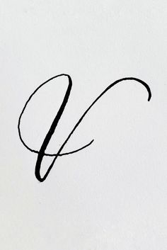 the letter c is written in cursive writing with black ink on white paper