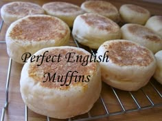 english muffins cooling on a rack with the words perfect english muffins