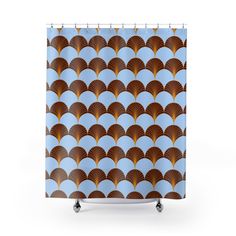 a shower curtain with an abstract design on it